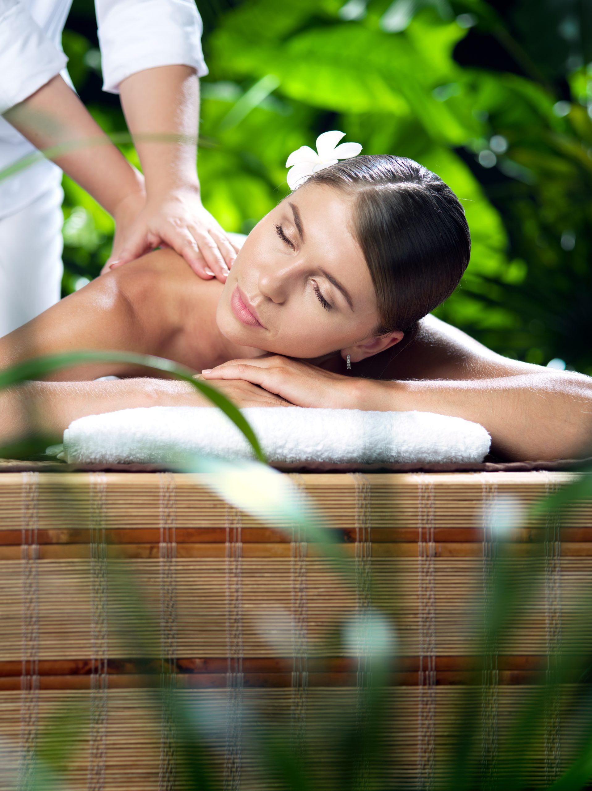 portrait of young beautiful woman in spa environment.